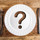question mark, question, empty, white, plate, fork, knife, wooden, table, natural light, rustic, top, overhead, directly above, wood, what to eat, idea, nobody, looking down, questions, concept, diet, nutrition, recommend, symbol, sign, food, dieting, guideline, uncertainty, lifestyle, health, problem, confusion, asking, ask, confused